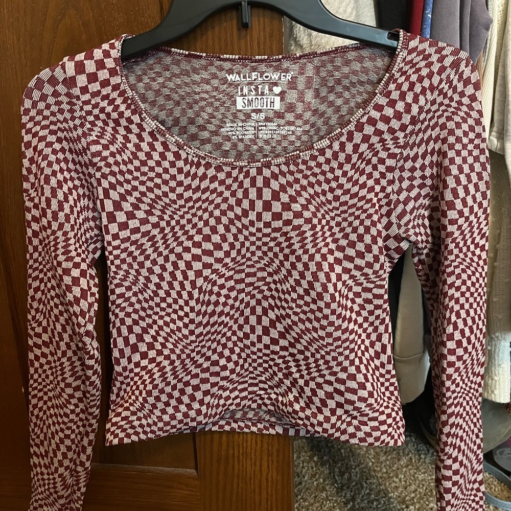 Burgundy checkered top.